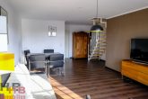 Wohnzimmer - Sonnendurchflutete 3,5-Zimmer-Maisonettewohnung in Oberneuland