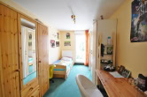 Schlafzimmer 1 Obergeschoss - Schickes Reihenendhaus mit großem Süd/West Grundstück in Oberneuland