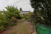 Garten - Kleines Reihenendhaus mit Wintergarten und Garage