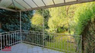 Geteviertel: Bremer Reihenhaus in herrlicher Lage mit großem Garten - Terrasse mit Glasüberdachung vom Esszimmer aus