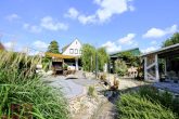 Ausblick auf die Terrasse - 4-Zimmer Einfamilienhaus mit traumhafter Terrasse und Doppelgarage