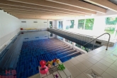 Schwimmen, Saunen, Wohnen! 4 Zi- Wohnung mit Garten und Garage - Beheiztes Hallenschwimmbad